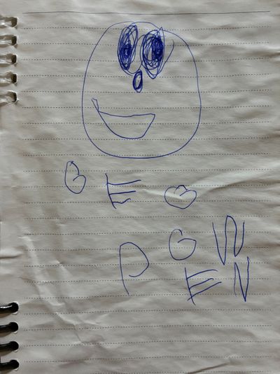 person and alphabet notebook drawing