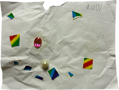 paper scraps and beads glued on paper